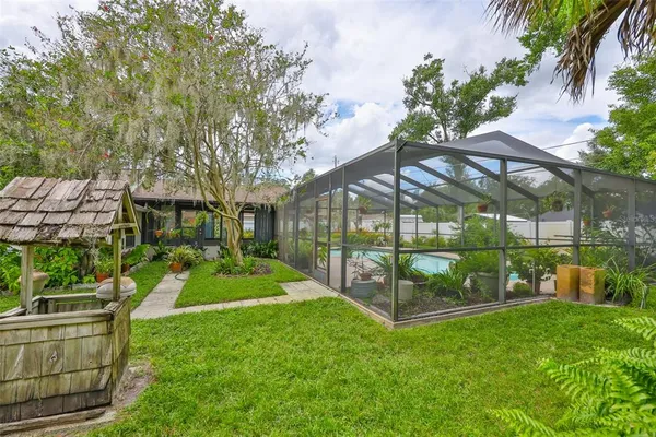a view of a swimming pool with a patio