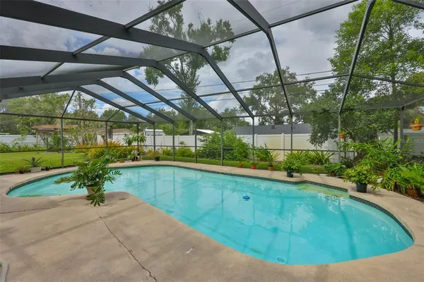 a view of yard with patio