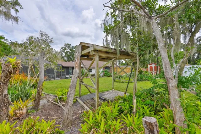 a view of a garden with a fountain