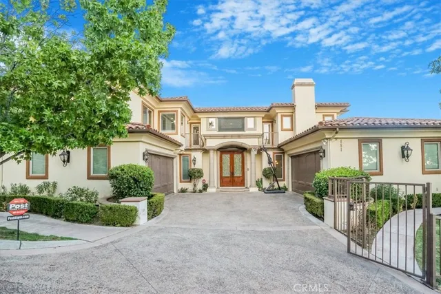 a front view of a house with yard