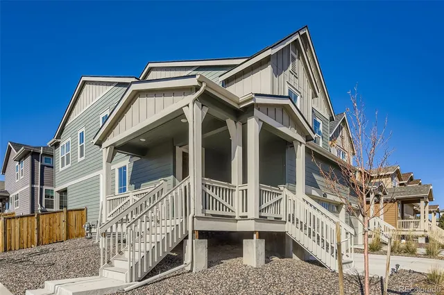 front view of a house with a small yard