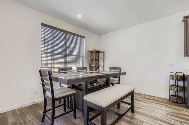 a view of a workspace with furniture