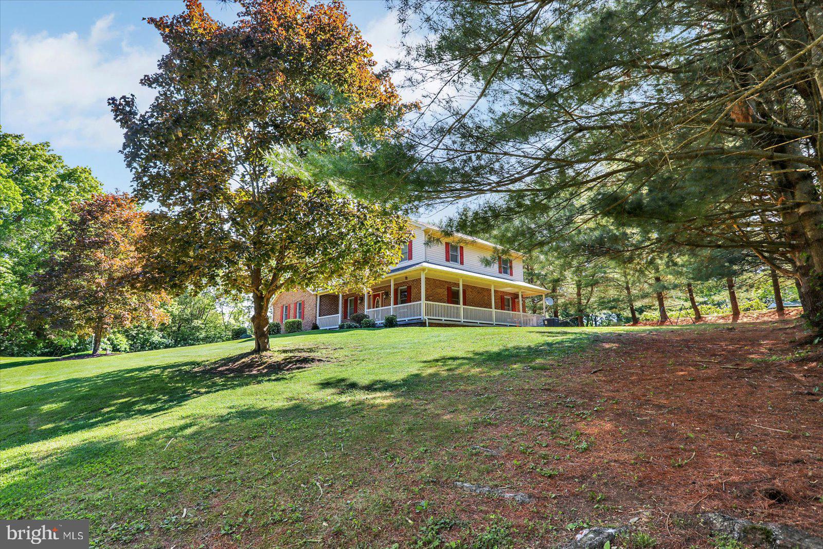 63 Lindsay Lane Hanover, PA 17331 - Photo 11 of 39 a view of a big yard with plants and large trees