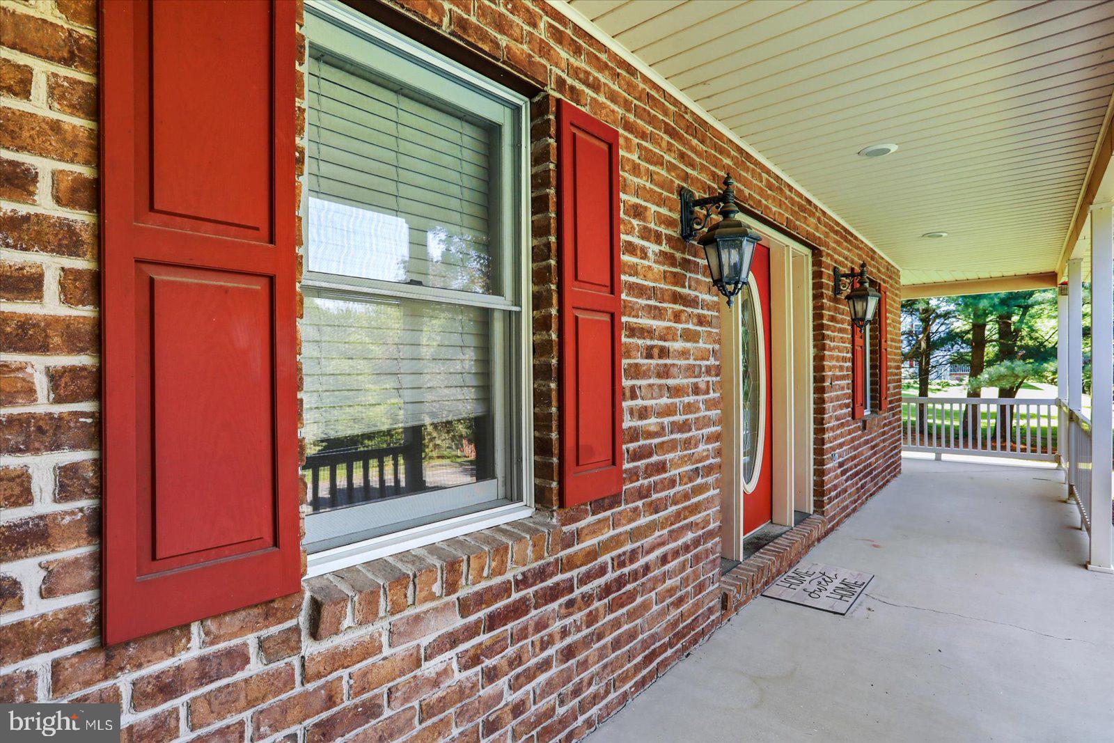 63 Lindsay Lane Hanover, PA 17331 - Photo 13 of 39 a view of a brick house with a large windows