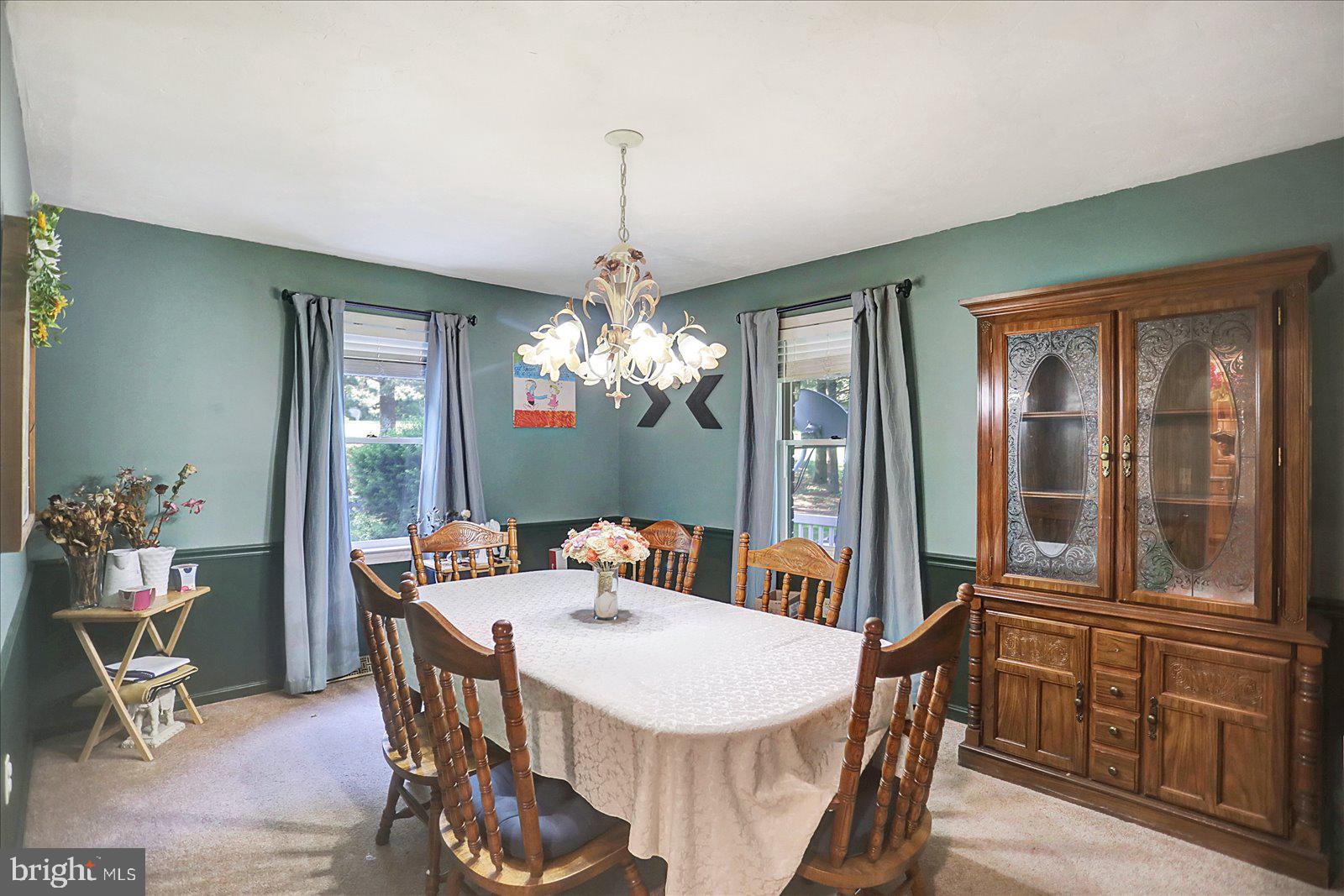 63 Lindsay Lane Hanover, PA 17331 - Photo 21 of 39 a view of a dining room with furniture window and wooden floor