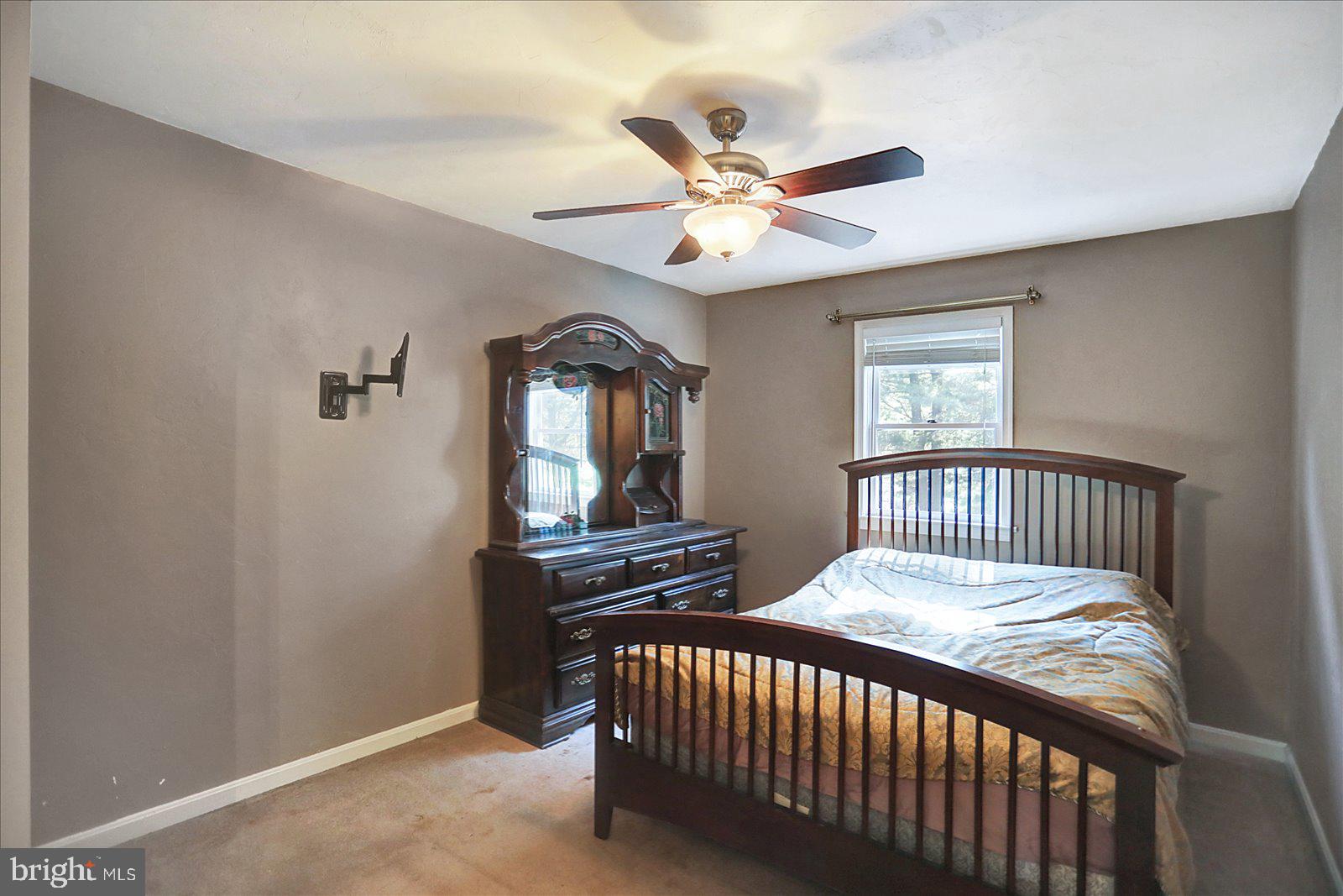 63 Lindsay Lane Hanover, PA 17331 - Photo 29 of 39 a bedroom with a bed and a window