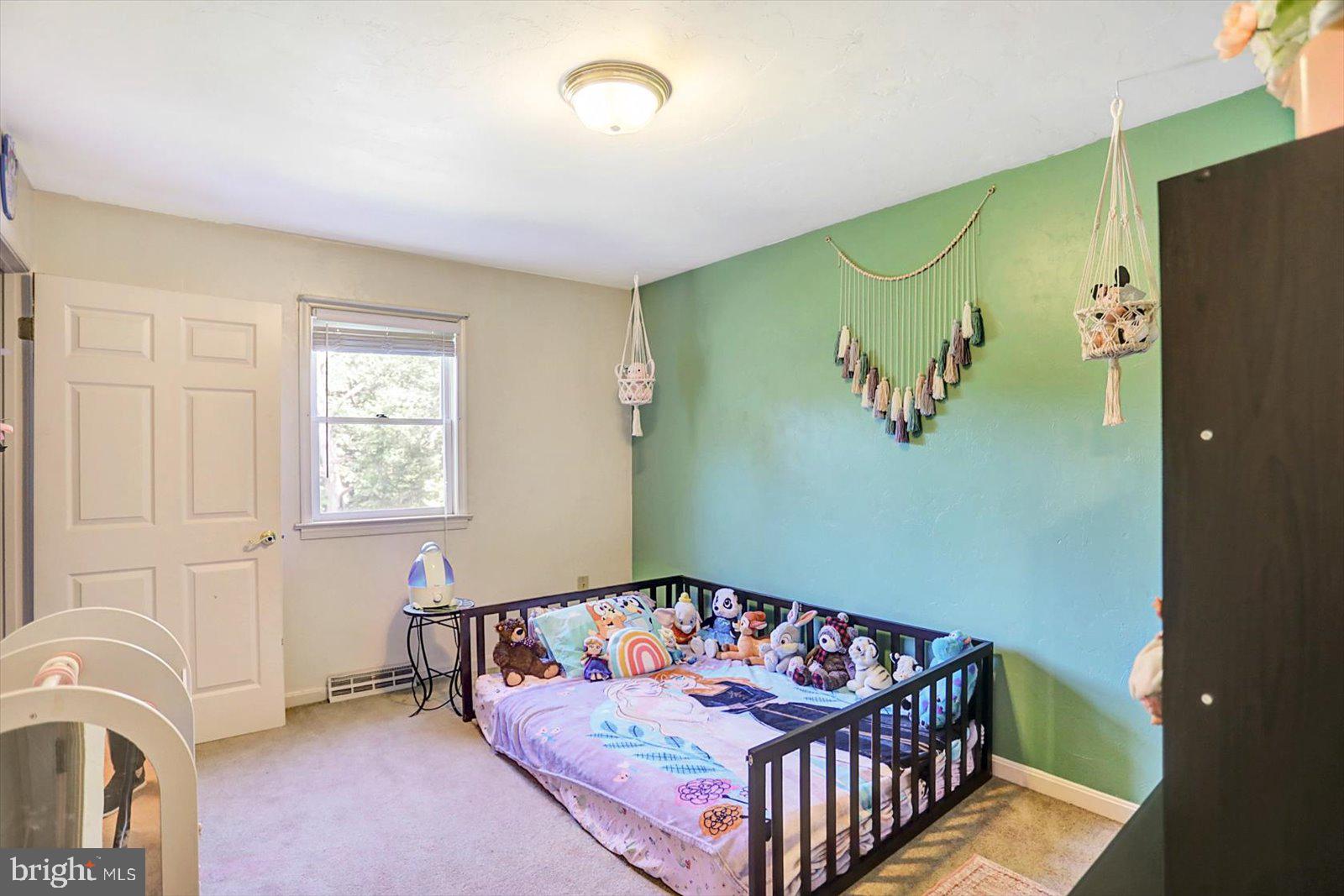 63 Lindsay Lane Hanover, PA 17331 - Photo 30 of 39 a bedroom with a bed and a window