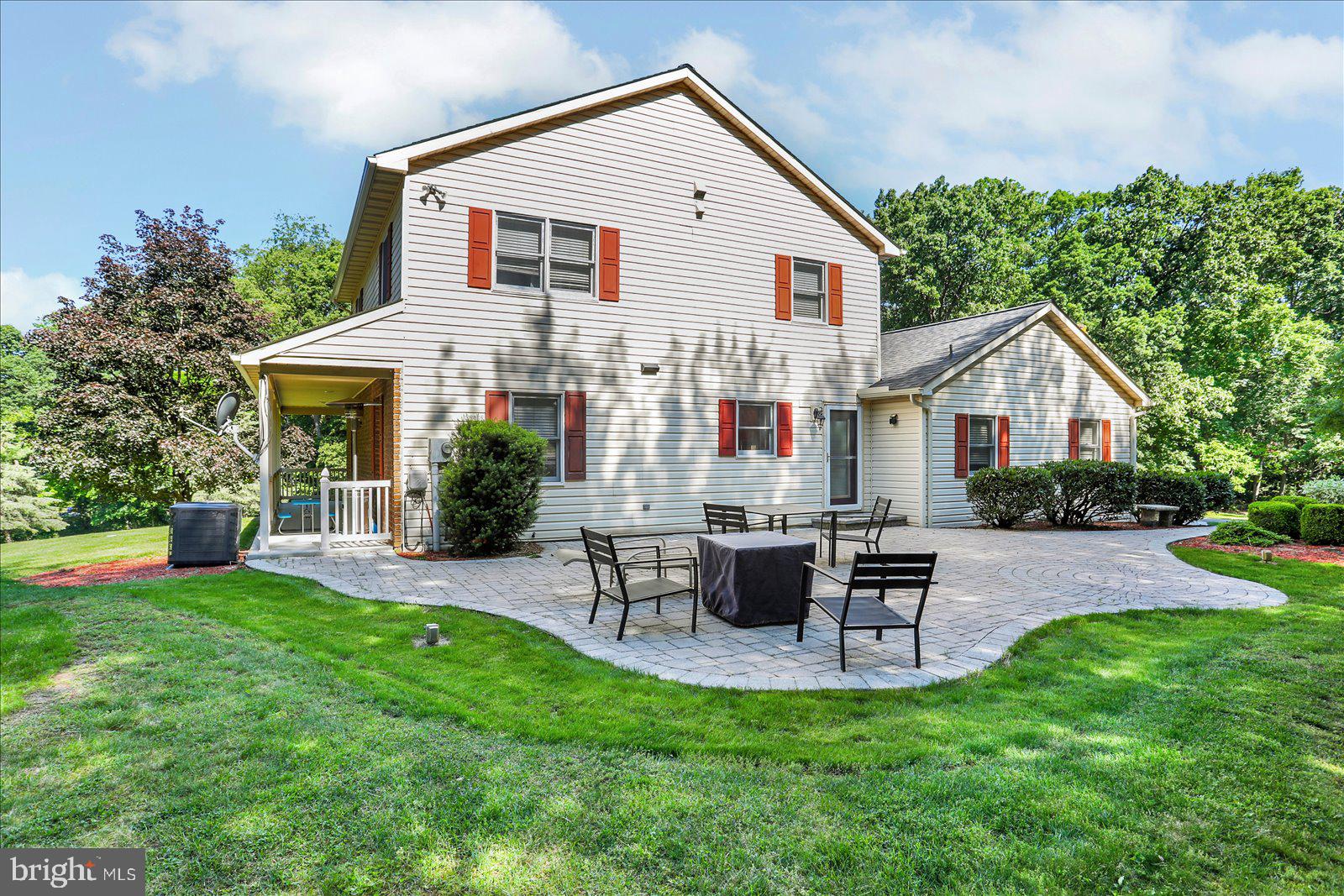 63 Lindsay Lane Hanover, PA 17331 - Photo 3 of 39 a view of a house with a yard and sitting area