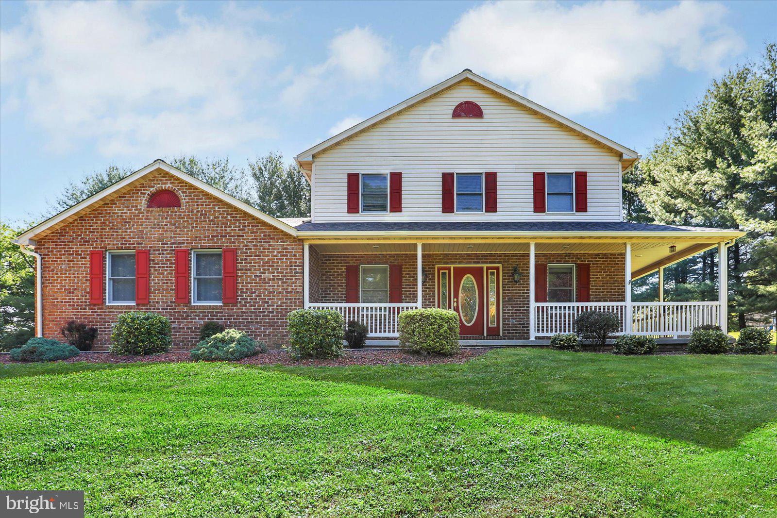 63 Lindsay Lane Hanover, PA 17331 - Photo 33 of 39 a front view of a house with garden