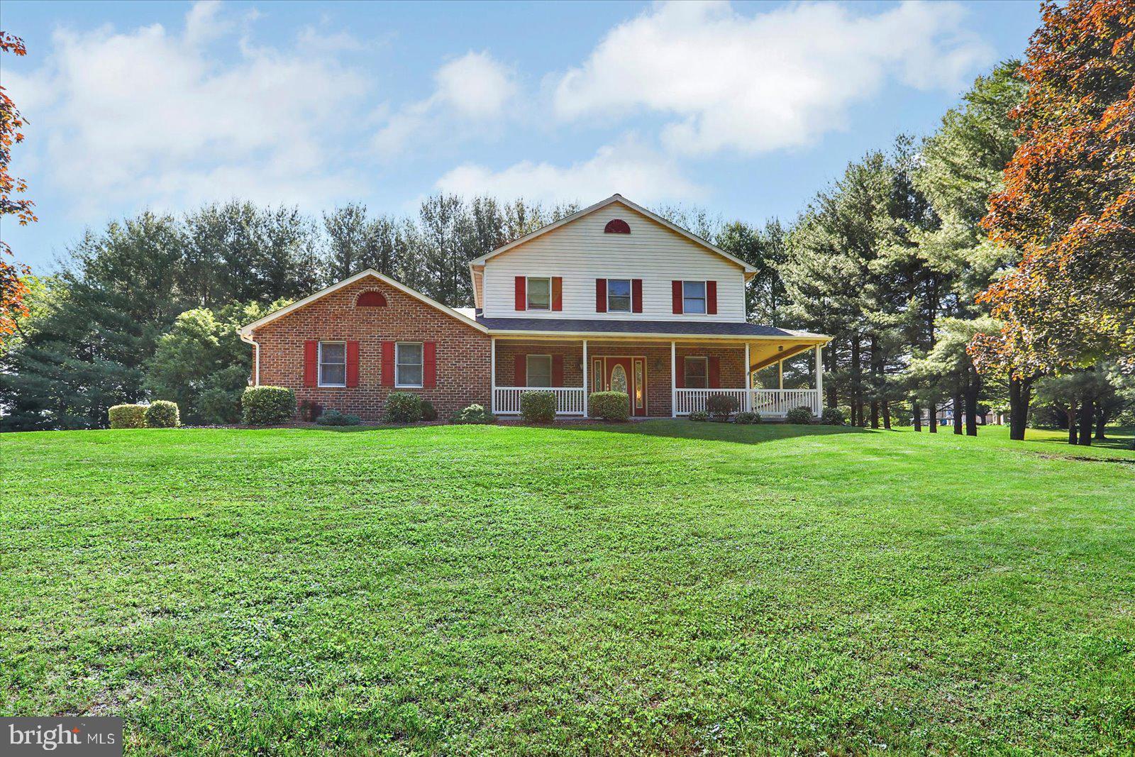 63 Lindsay Lane Hanover, PA 17331 - Photo 9 of 39 a front view of a house with a yard