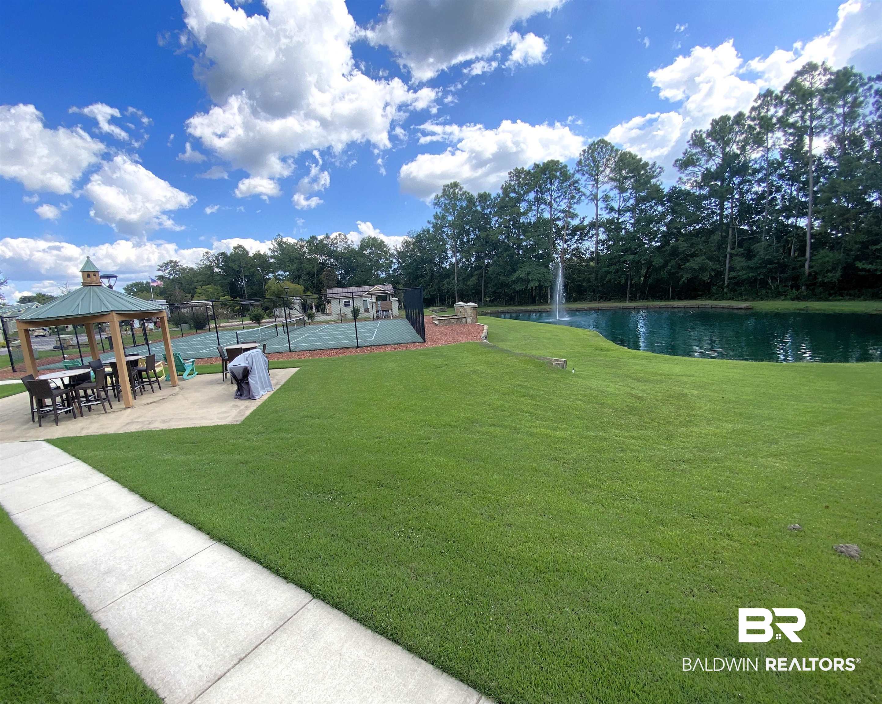 28121 Migratory Way Elberta, AL 36530 - Photo 46 of 51 View of yard featuring a gazebo and a water view