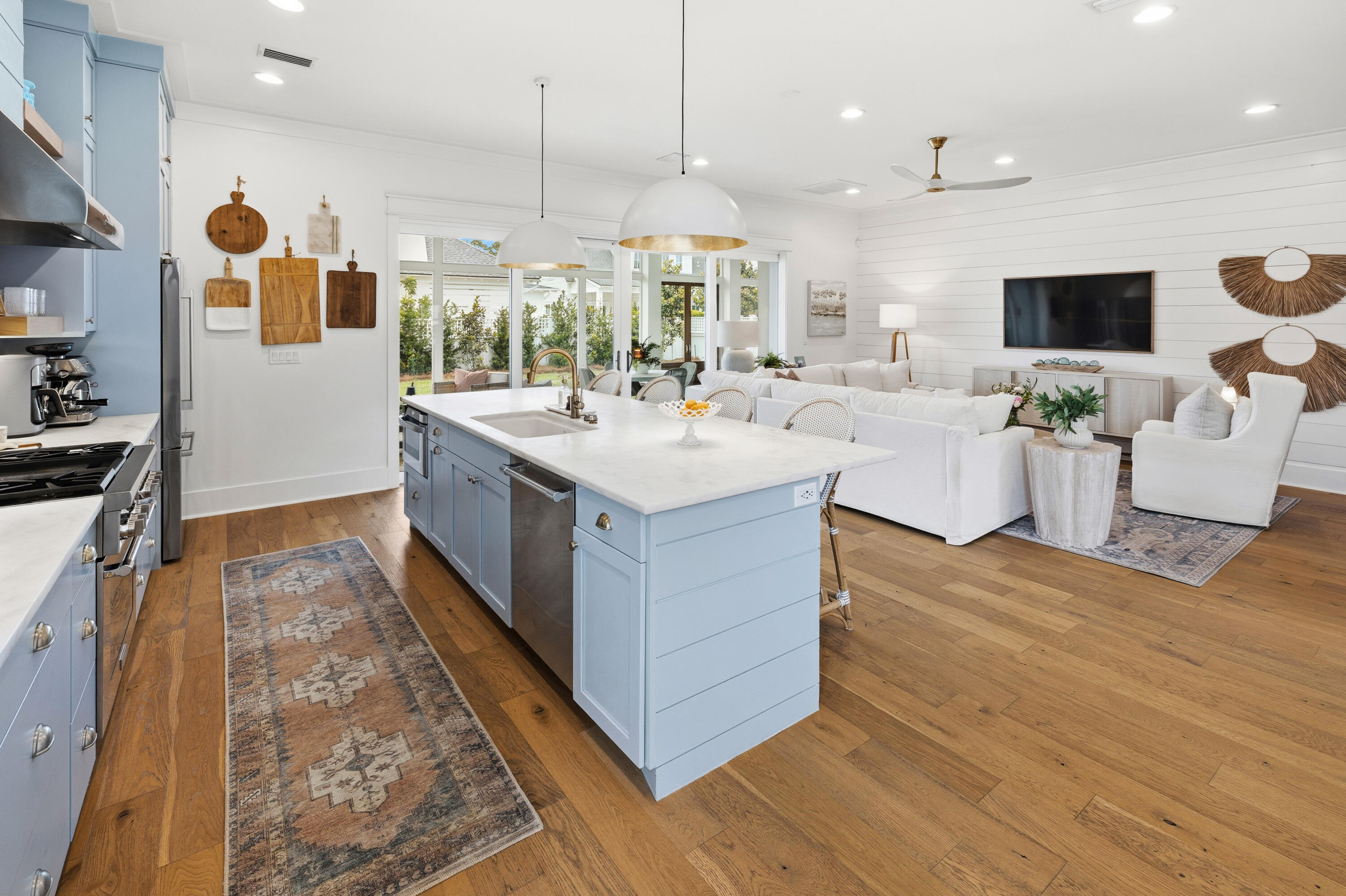 113 Catface Dr Inlet Beach Inlet Beach, FL 32461 - Photo 20 of 53 a large kitchen with kitchen island a stove a sink a center island and wooden floor