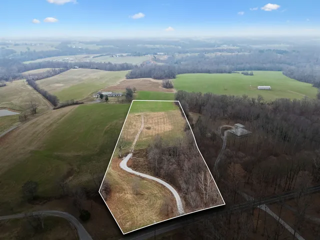 a view of a yard with a barn