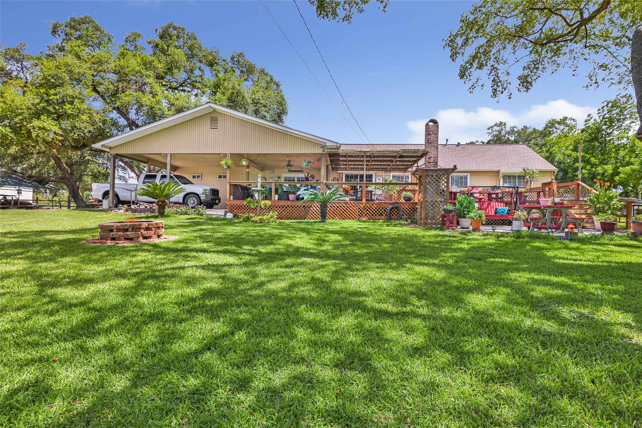111 South 8th Street Highlands, TX 77562 - Photo 13 of 50 a view of a house with a yard porch and sitting area