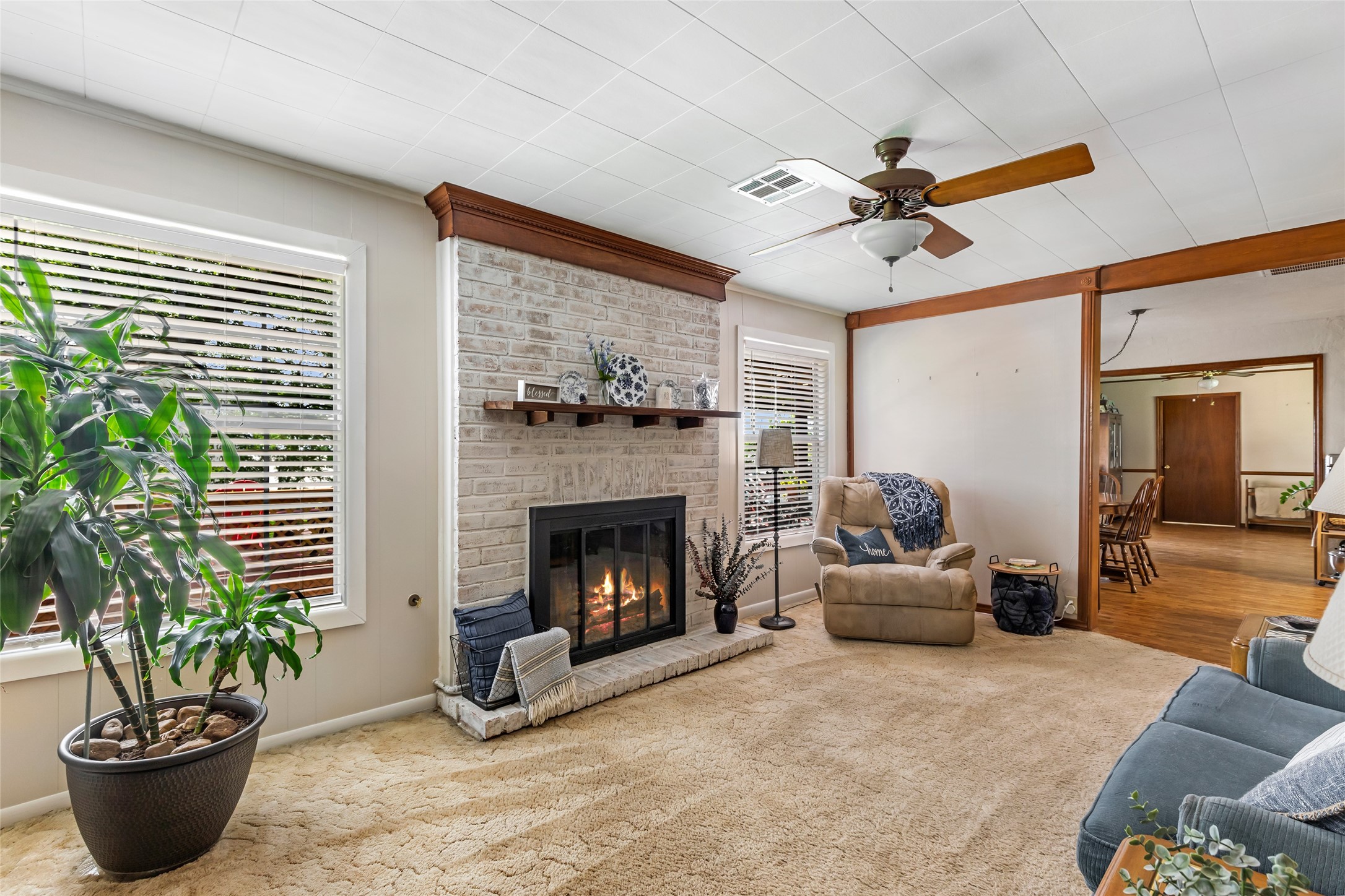 111 South 8th Street Highlands, TX 77562 - Photo 30 of 50 a living room with furniture and a fireplace