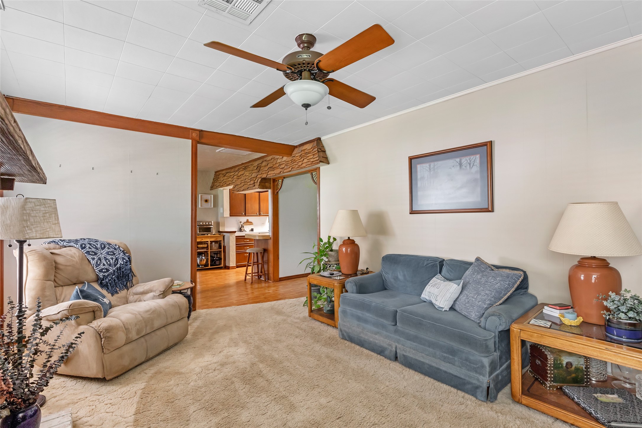 111 South 8th Street Highlands, TX 77562 - Photo 31 of 50 a living room with furniture and a wooden floor