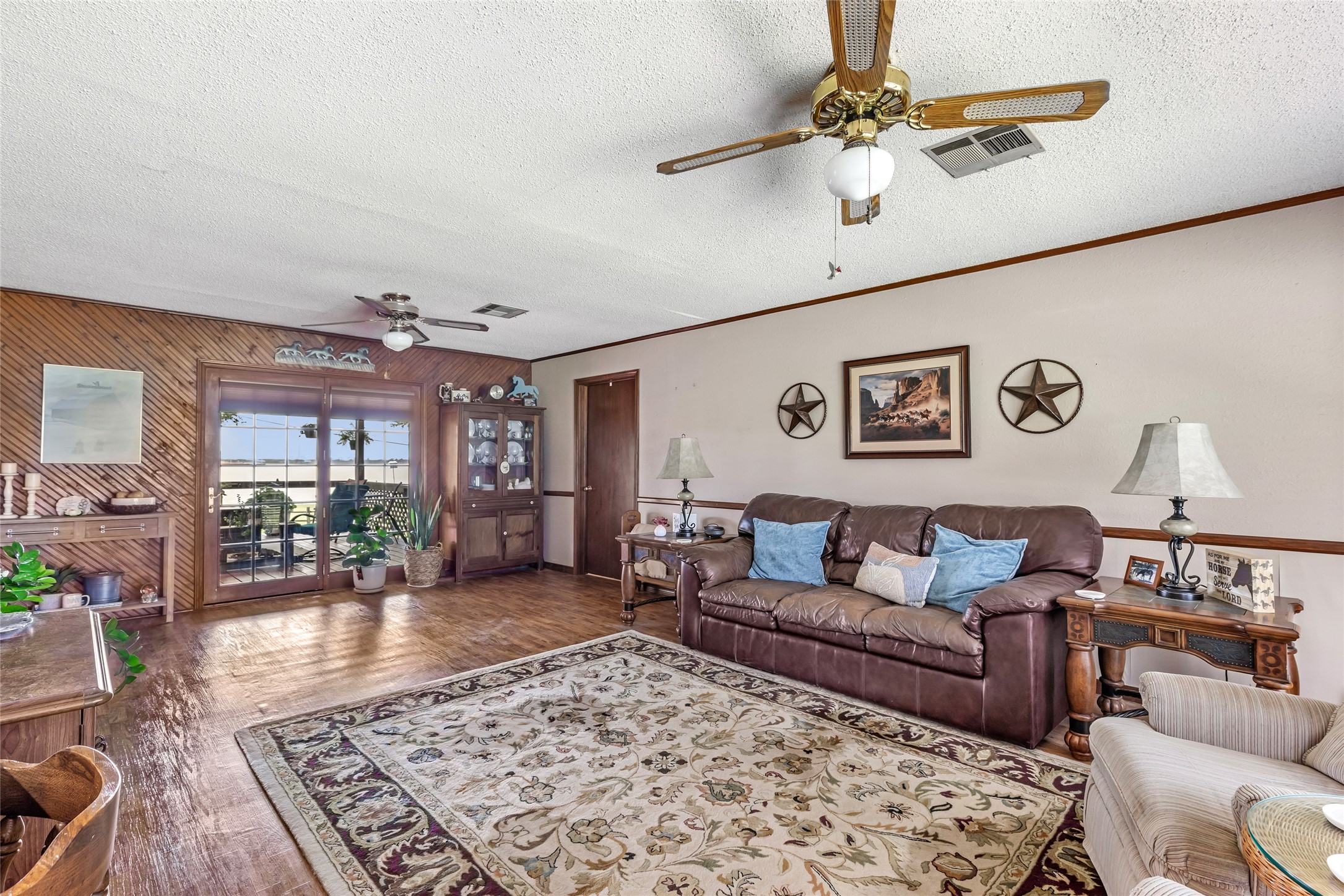 111 South 8th Street Highlands, TX 77562 - Photo 39 of 50 a living room with furniture and a rug