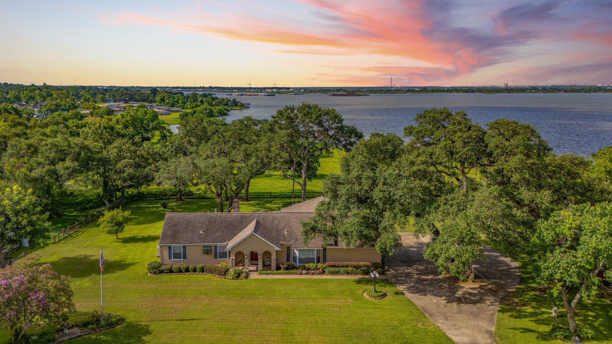 111 South 8th Street Highlands, TX 77562 - Photo 48 of 50 an aerial view of a house with garden space and outdoor seating