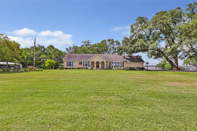 a view of a house with a big yard