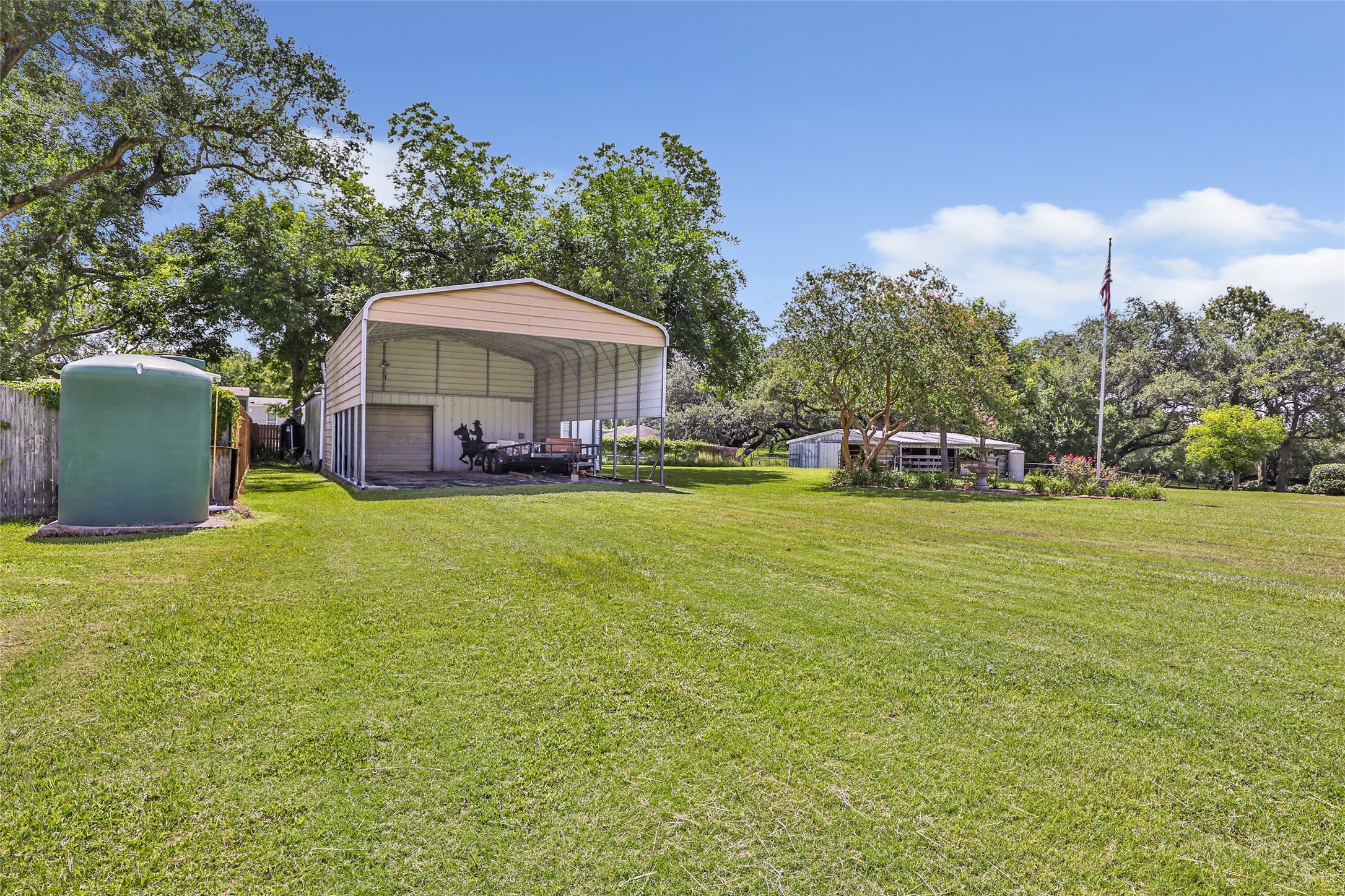 111 South 8th Street Highlands, TX 77562 - Photo 6 of 50 a view of a house with a yard and sitting area