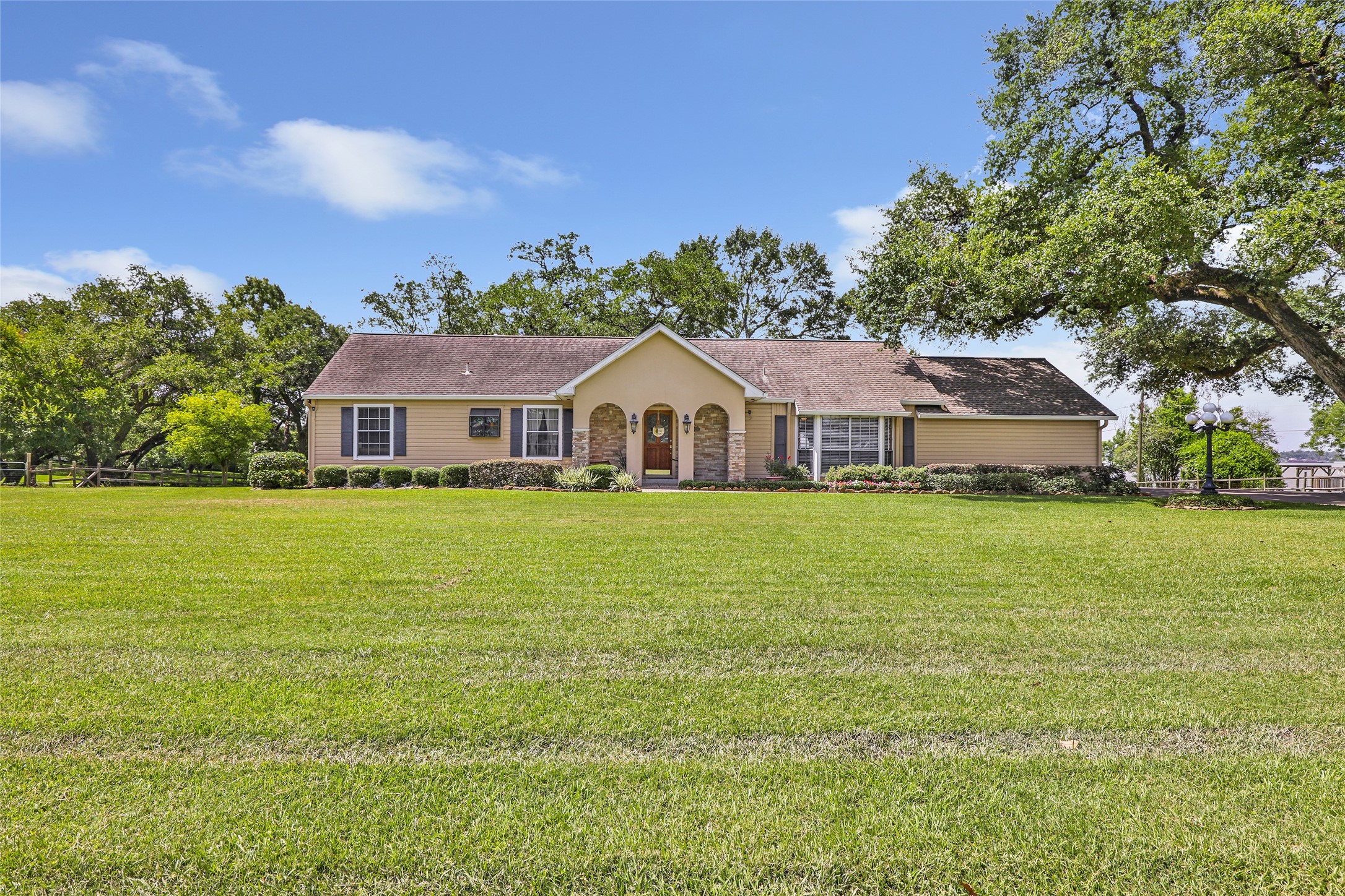 111 South 8th Street Highlands, TX 77562 - Photo 7 of 50 a front view of house with yard and green space