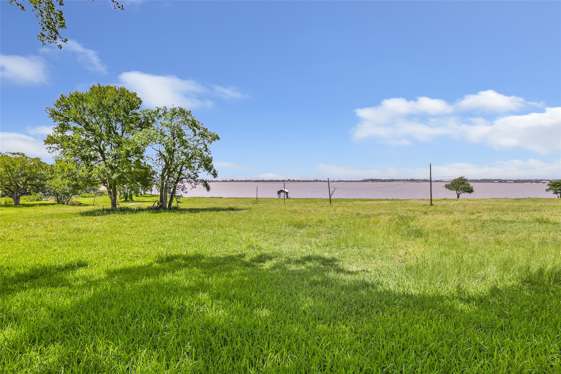 111 South 8th Street Highlands, TX 77562 - Photo 10 of 50 a view of green field