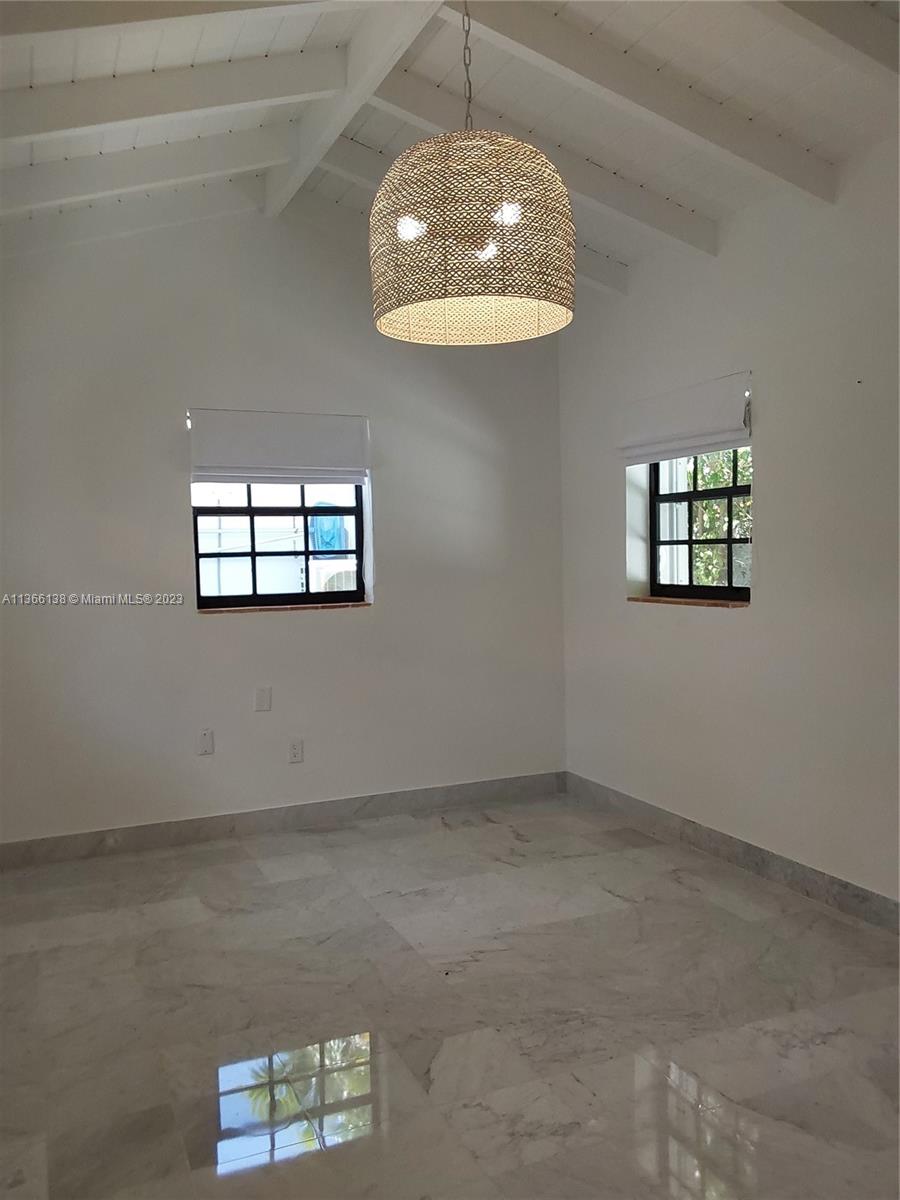 La Gorce Miami Beach, FL 33140 - Photo 17 of 33 en empty room with windows