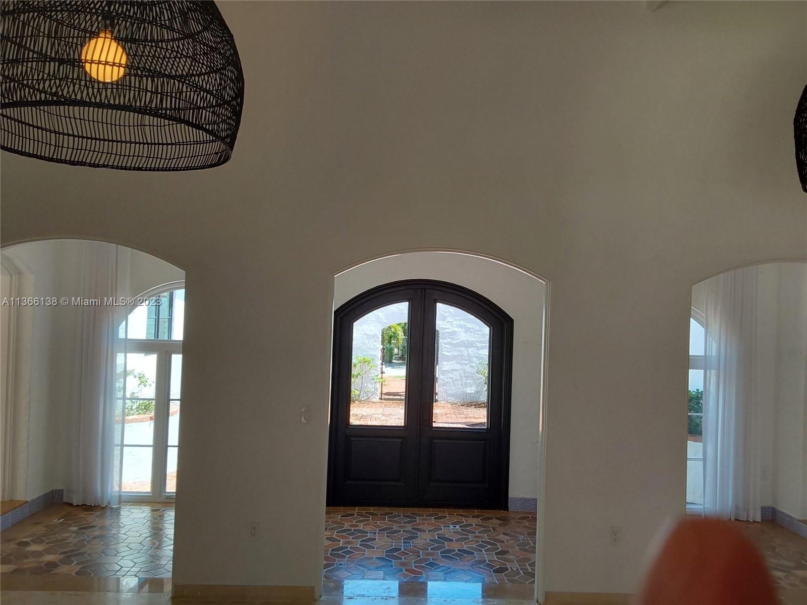 La Gorce Miami Beach, FL 33140 - Photo 22 of 33 a view of entryway with wooden floor