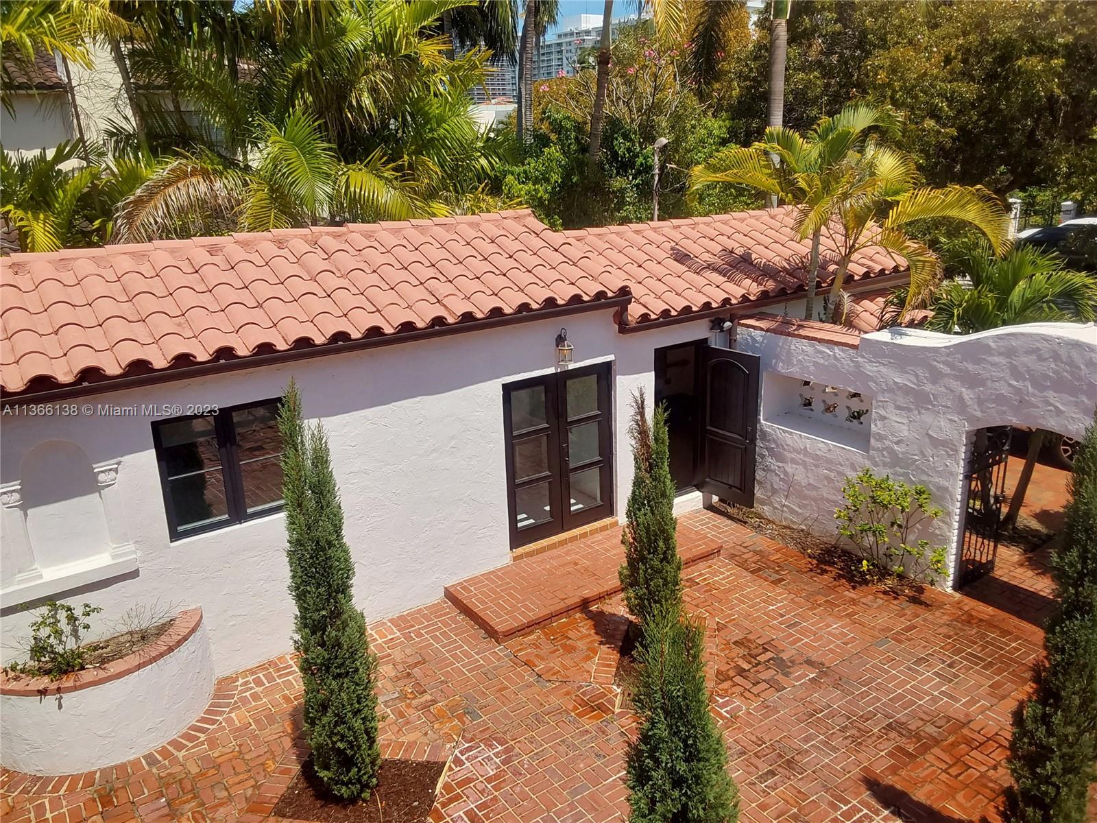 La Gorce Miami Beach, FL 33140 - Photo 7 of 33 a house view with a outdoor space