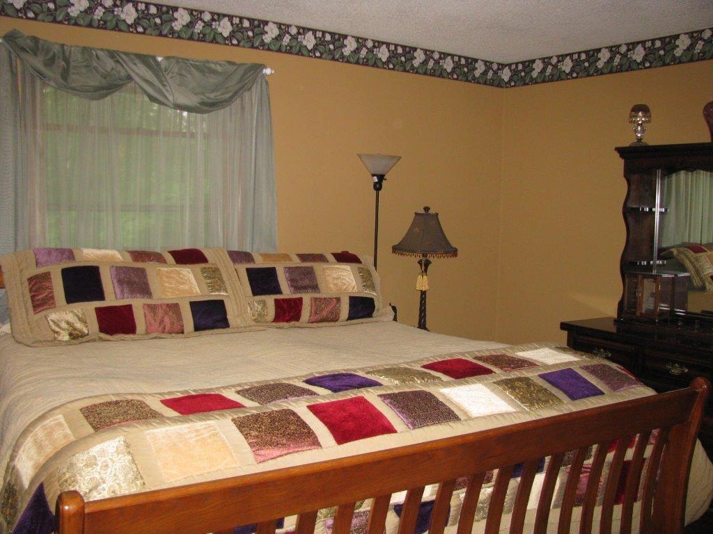 1421 Industry Road Industry, ME 04938 - Photo 9 of 22 Master Bedroom