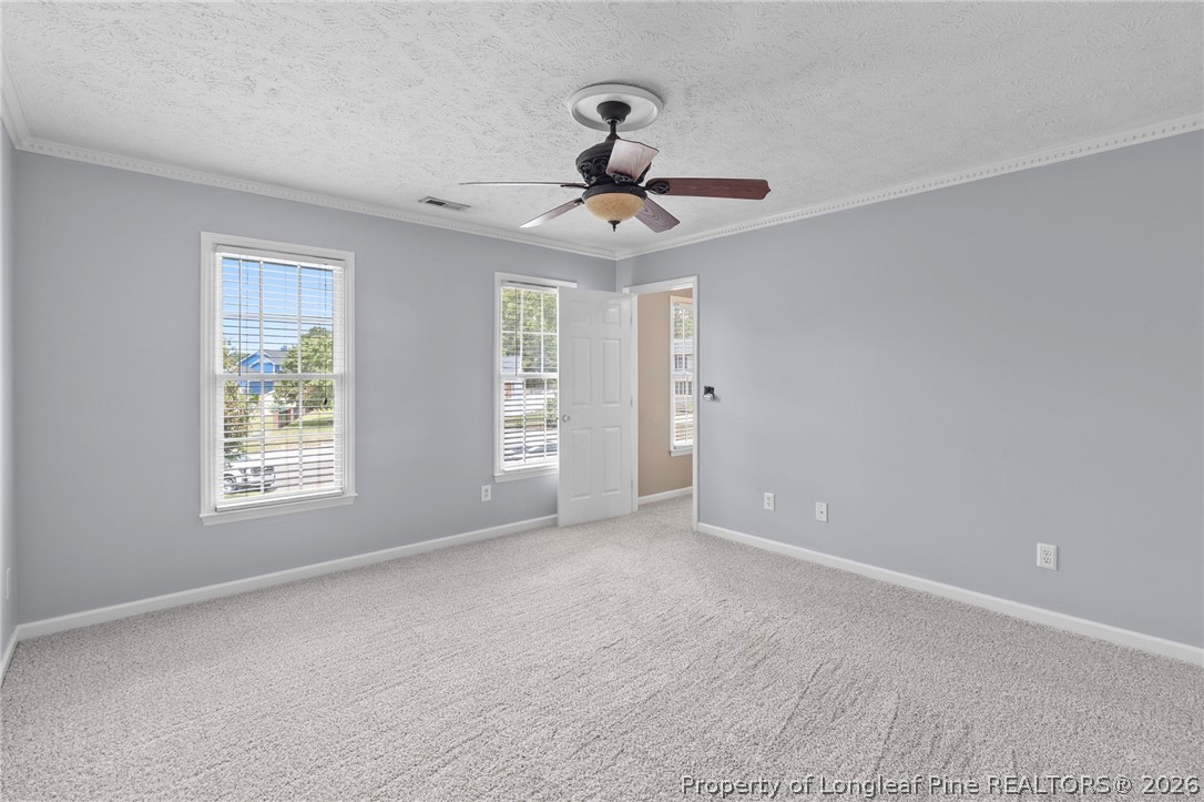 28 Coyt Circle Spring Lake, NC 28390 - Photo 19 of 41 a view of an empty room with a window