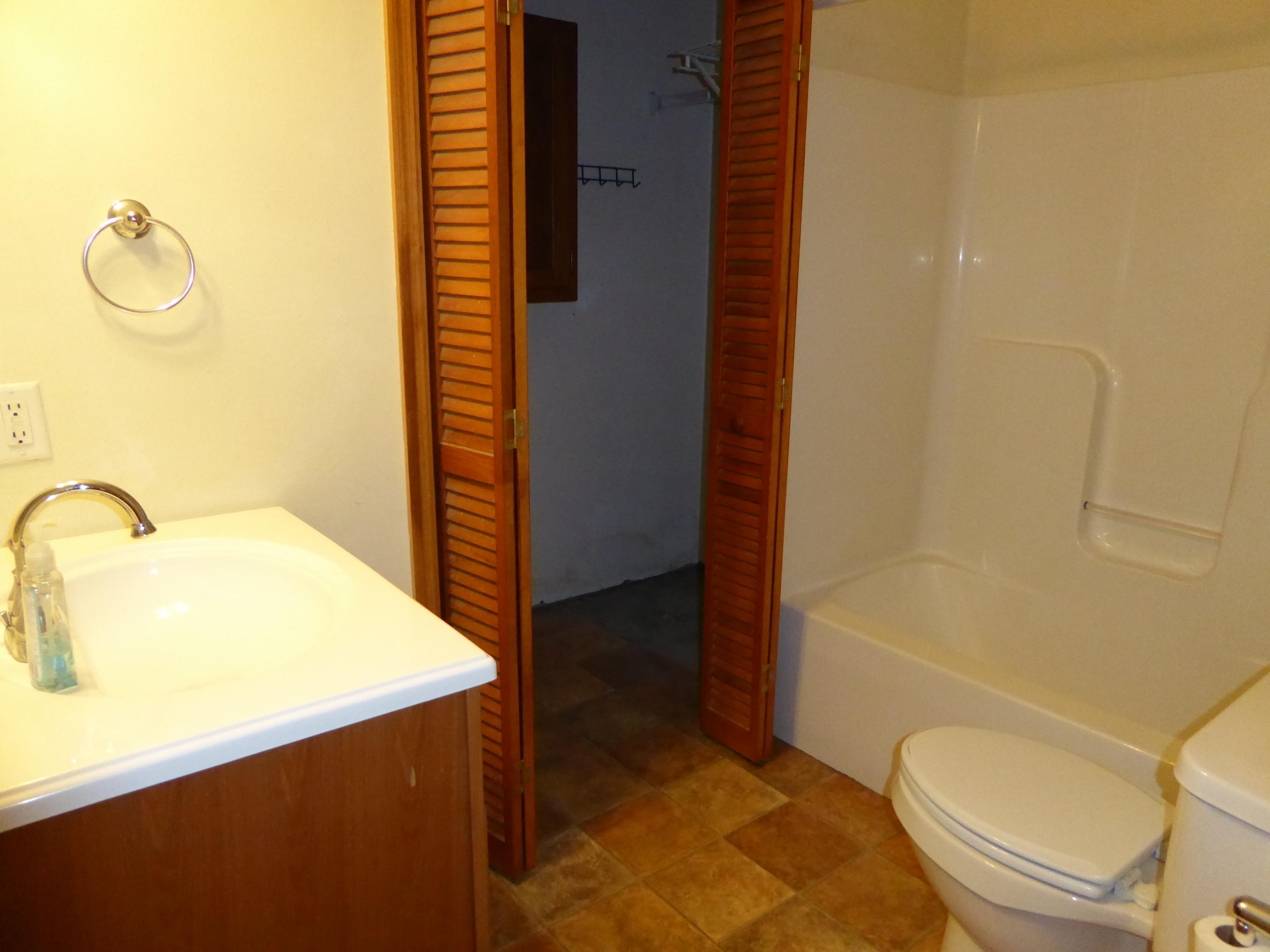 3062 Saunders Road Vinton, VA 24179 - Photo 18 of 40 a bathroom with a sink a toilet and shower