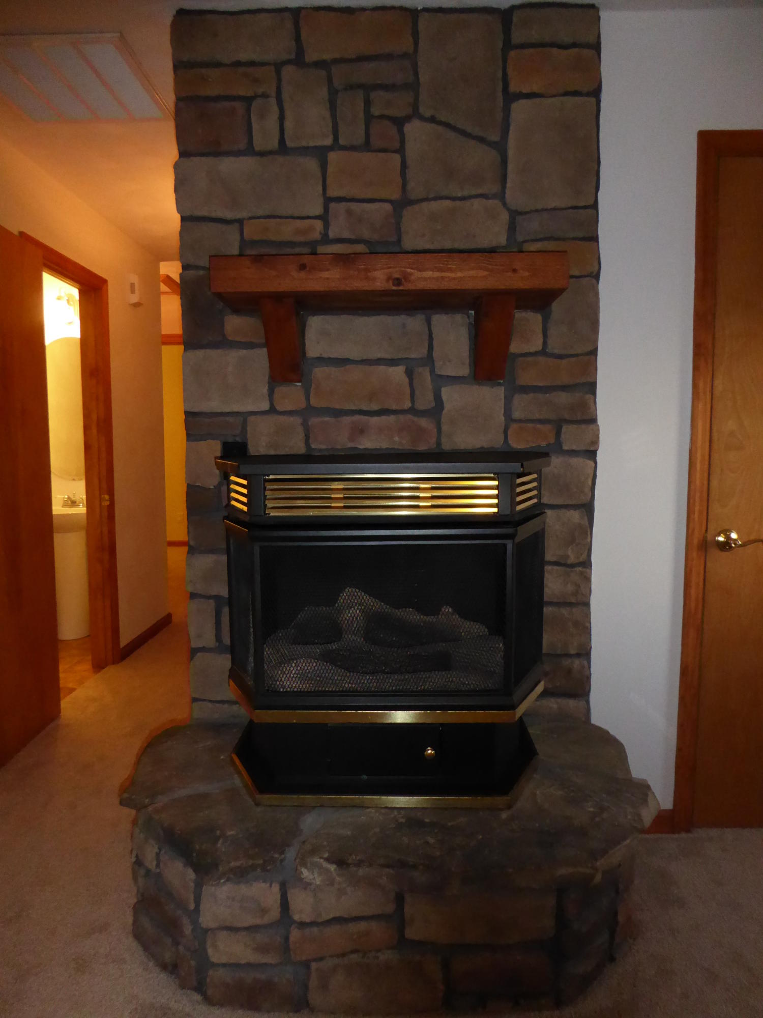 3062 Saunders Road Vinton, VA 24179 - Photo 5 of 40 a living room with furniture and a fireplace