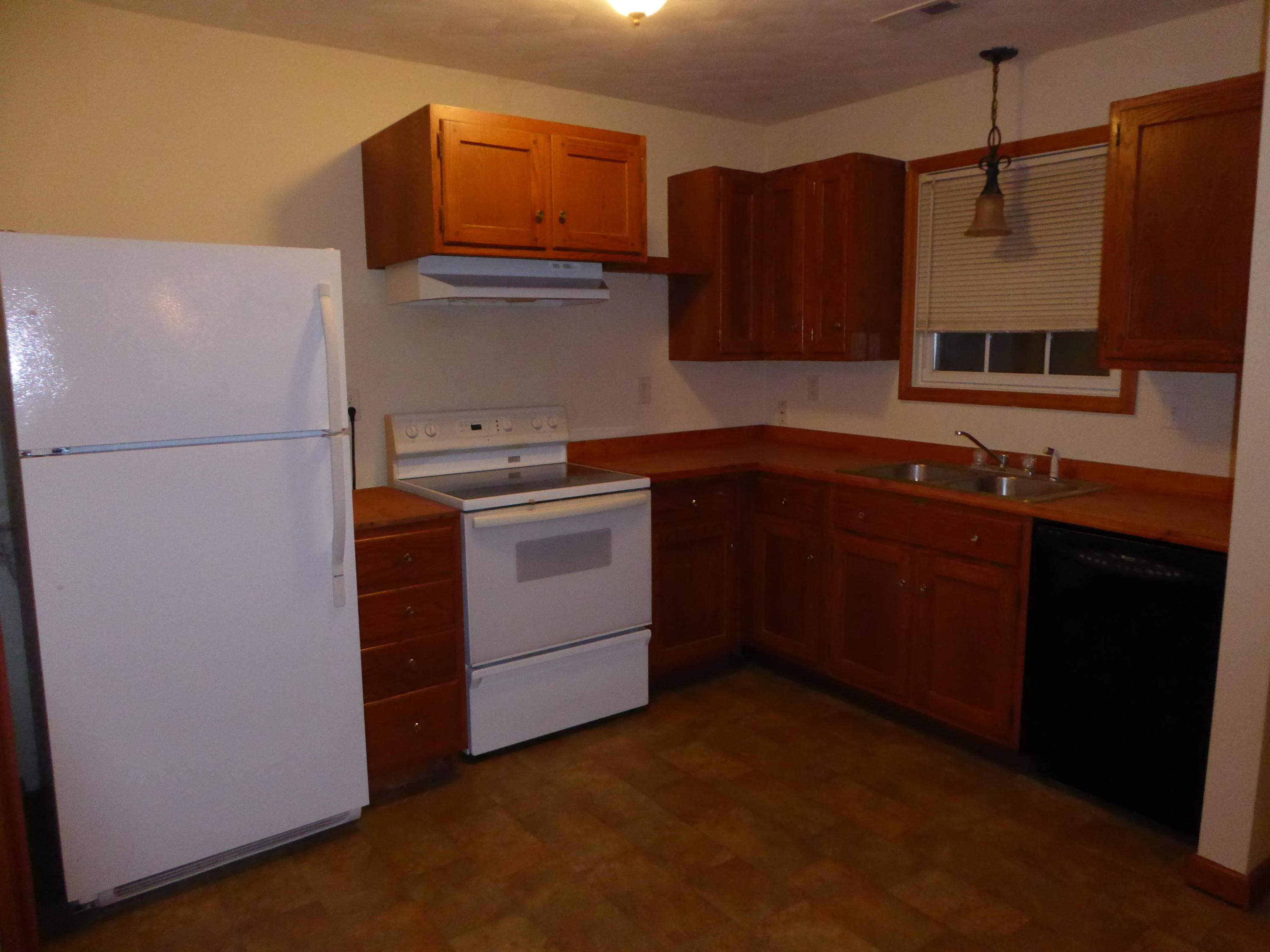 3062 Saunders Road Vinton, VA 24179 - Photo 7 of 40 a kitchen with a sink and a refrigerator
