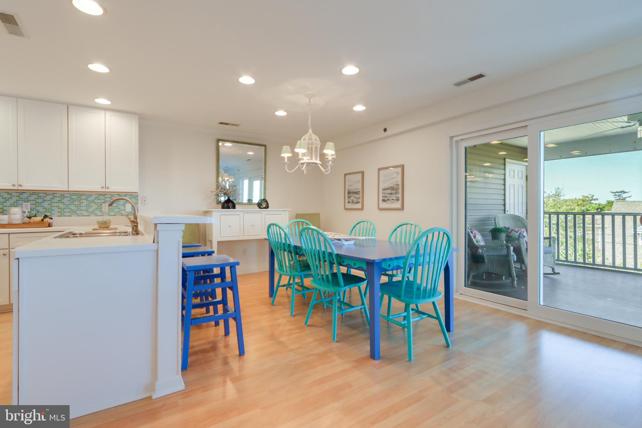 24 Brooklyn Avenue, Unit E Rehoboth Beach, DE 19971 - Photo 18 of 74 a view of kitchen with dining area