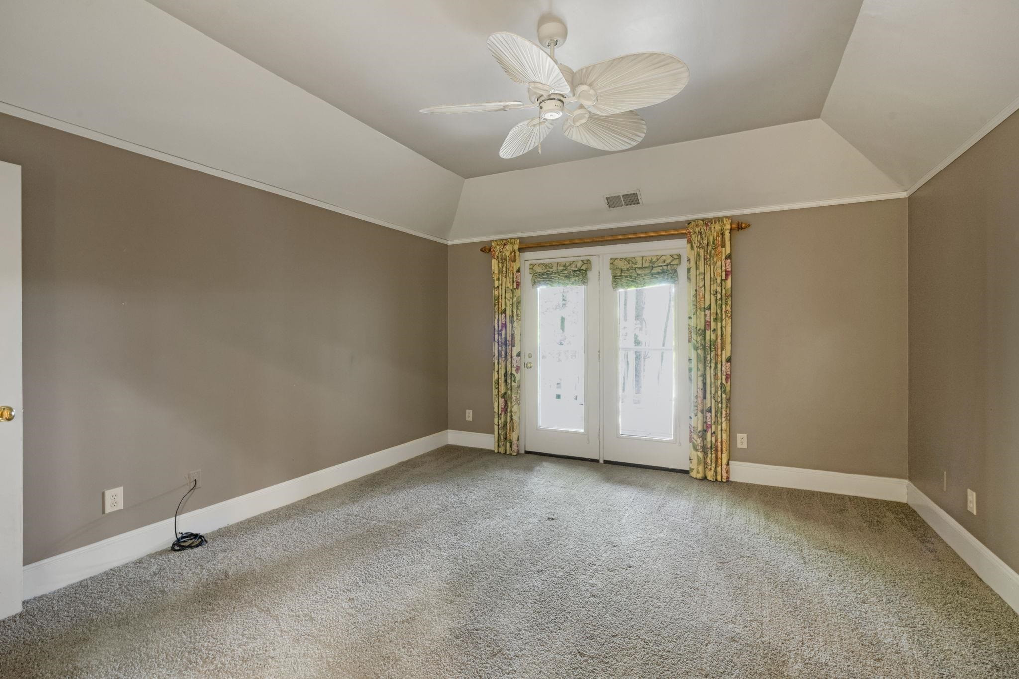 7500 Dartford Court, Unit 102 Raleigh, NC 27615 - Photo 17 of 36 a view of an empty room with a window
