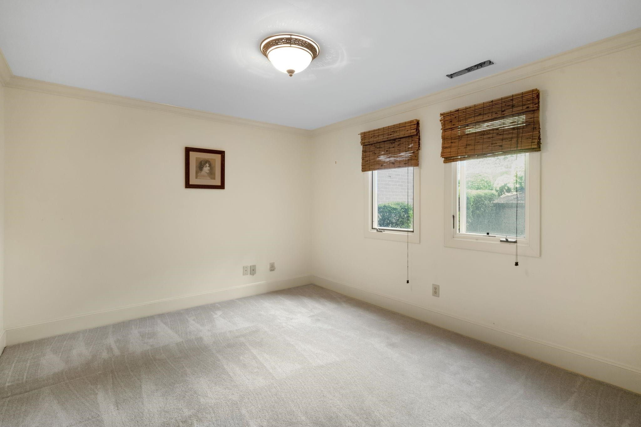 7500 Dartford Court, Unit 102 Raleigh, NC 27615 - Photo 25 of 36 an empty room with a window