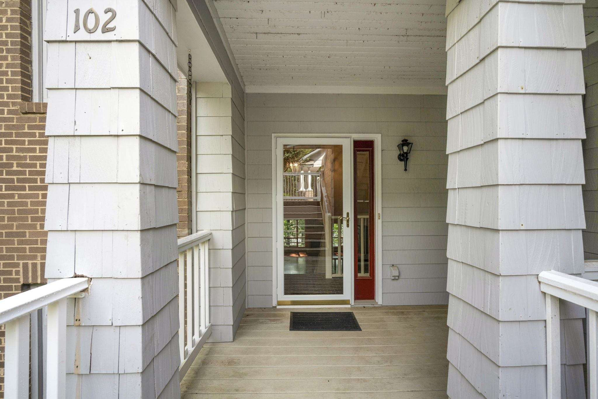 7500 Dartford Court, Unit 102 Raleigh, NC 27615 - Photo 3 of 36 a view of wooden door