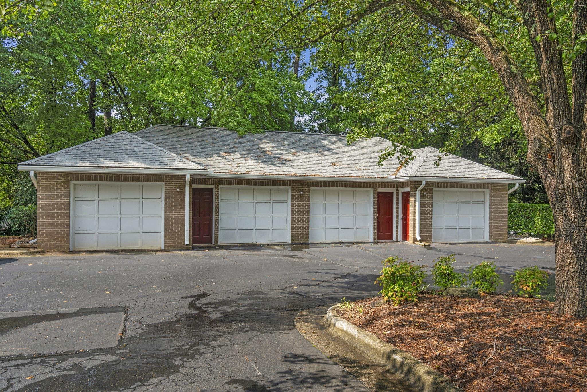 7500 Dartford Court, Unit 102 Raleigh, NC 27615 - Photo 36 of 36 front view of a house with a yard