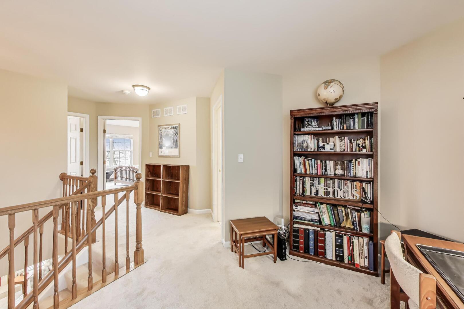 856 Old Checker Road Buffalo Grove, IL 60089 - Photo 16 of 31 a livingroom with furniture wooden floor and a window