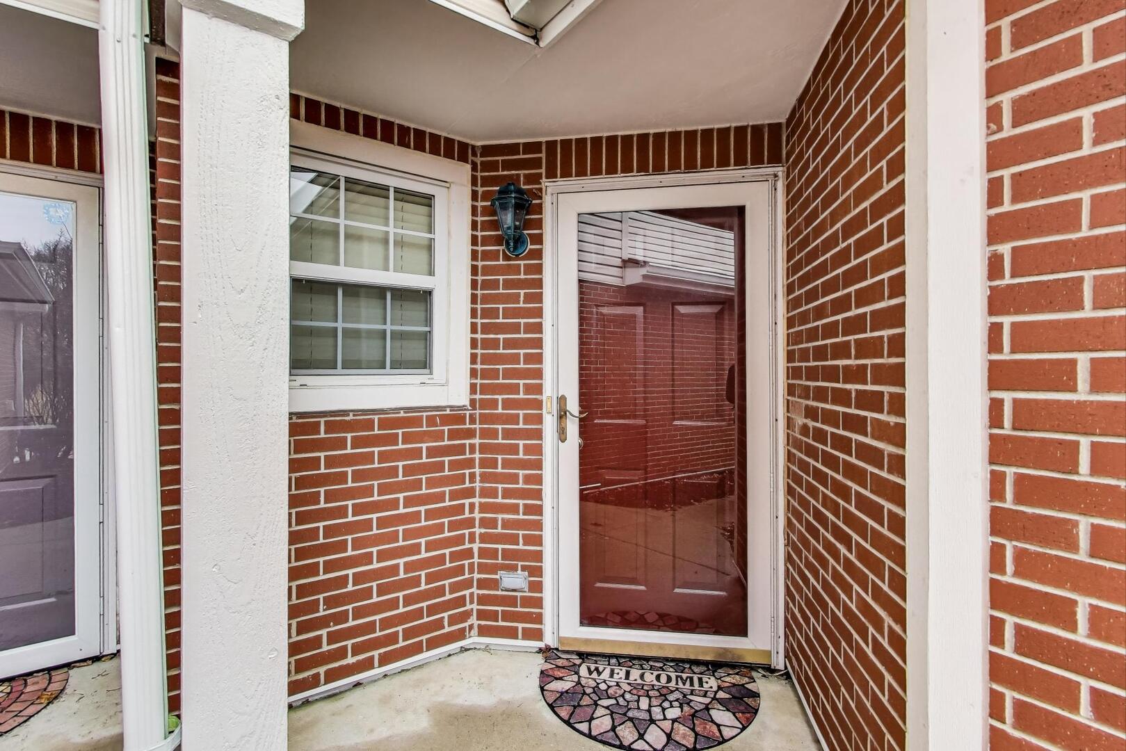 856 Old Checker Road Buffalo Grove, IL 60089 - Photo 2 of 31 a view of door