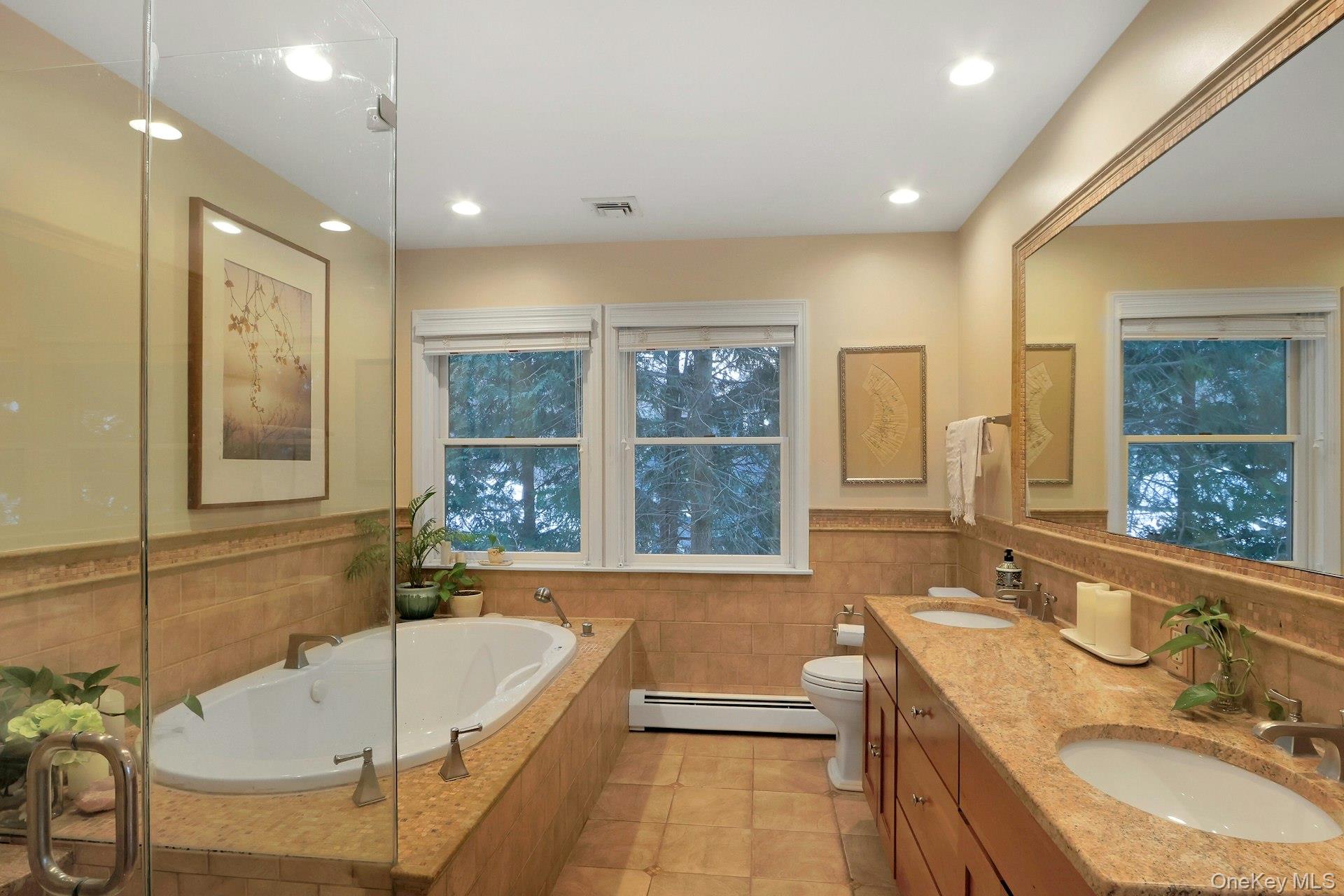 111 Wydendown Road Nyack, NY 10960 - Photo 22 of 46 a bathroom with a granite countertop tub sink and mirror