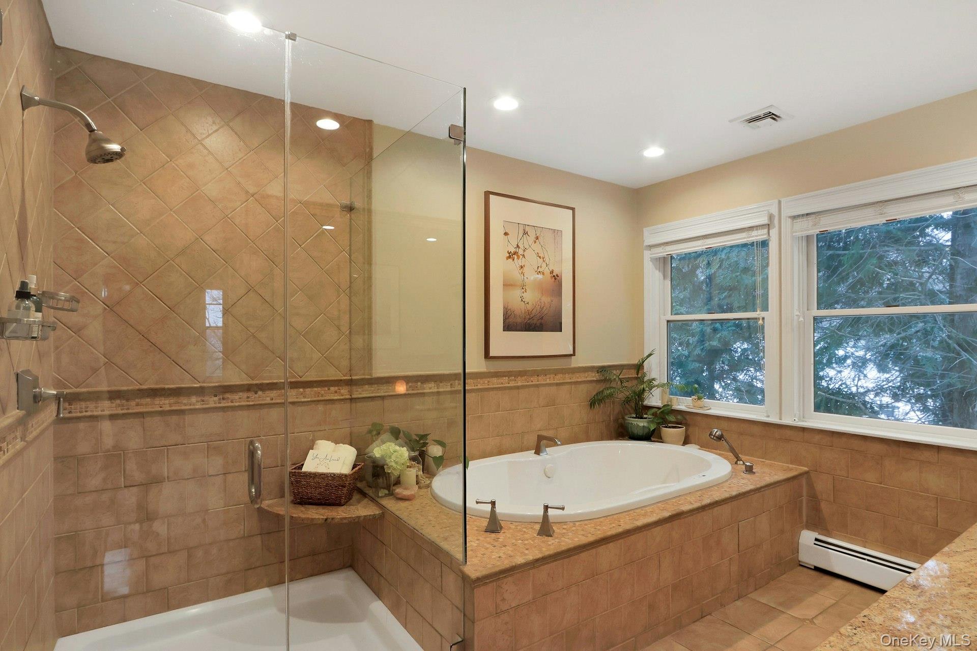 111 Wydendown Road Nyack, NY 10960 - Photo 23 of 46 a bathroom with a tub and a shower