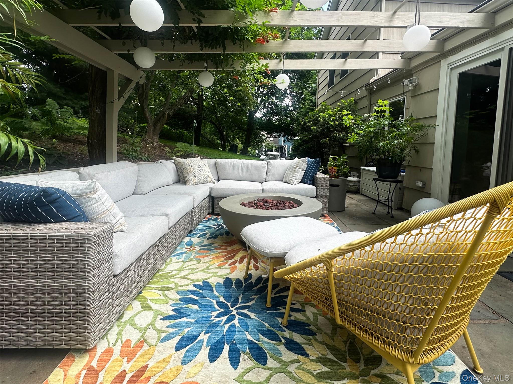 111 Wydendown Road Nyack, NY 10960 - Photo 40 of 46 a view of a patio with couches and potted plants