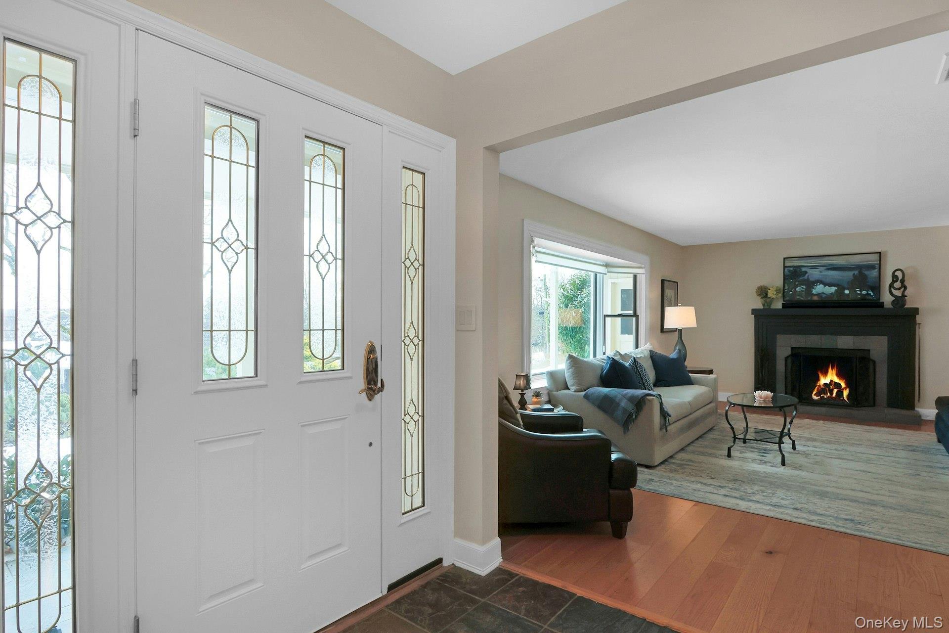 111 Wydendown Road Nyack, NY 10960 - Photo 5 of 46 a living room with furniture and a fireplace