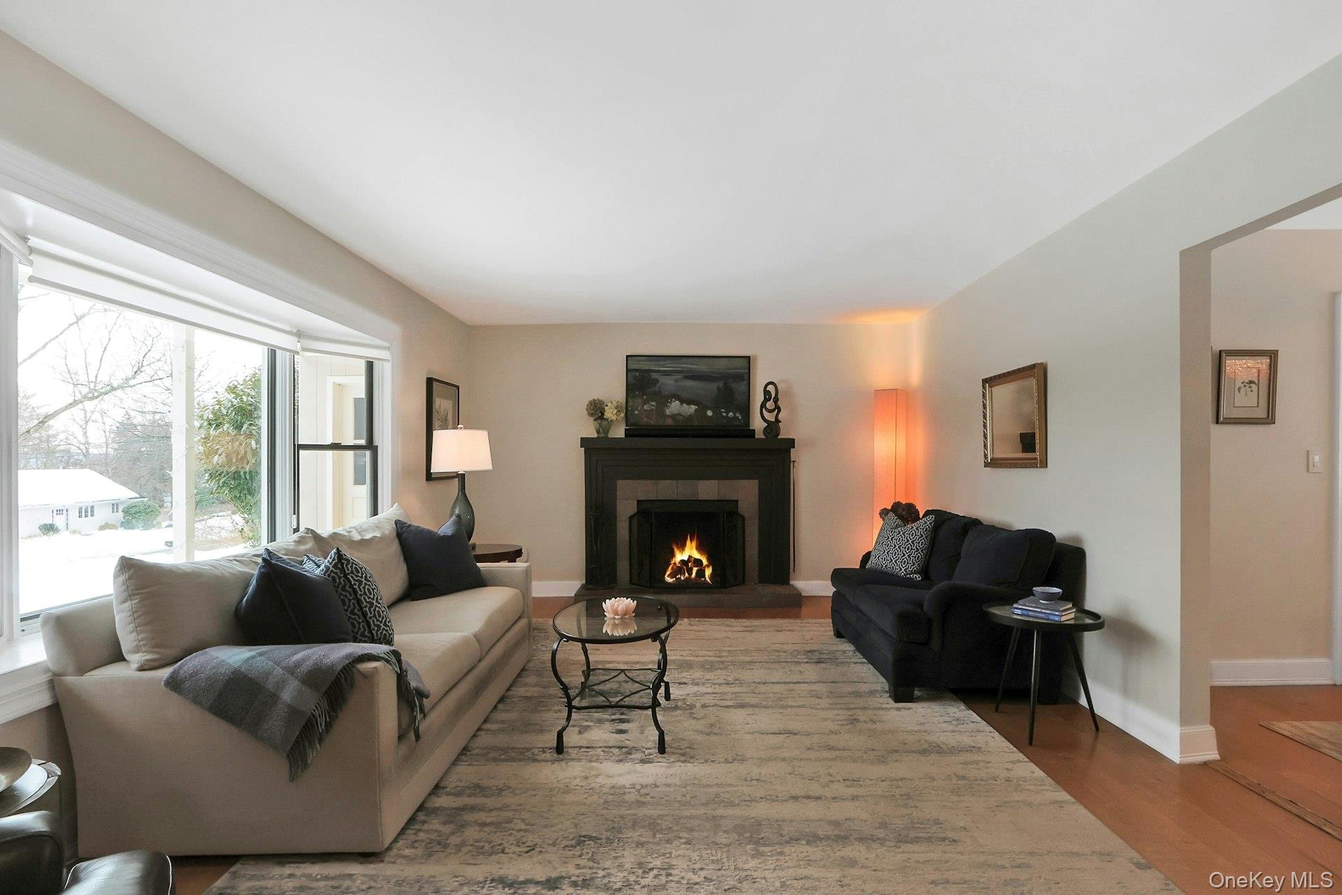 111 Wydendown Road Nyack, NY 10960 - Photo 8 of 46 a living room with furniture and a fireplace