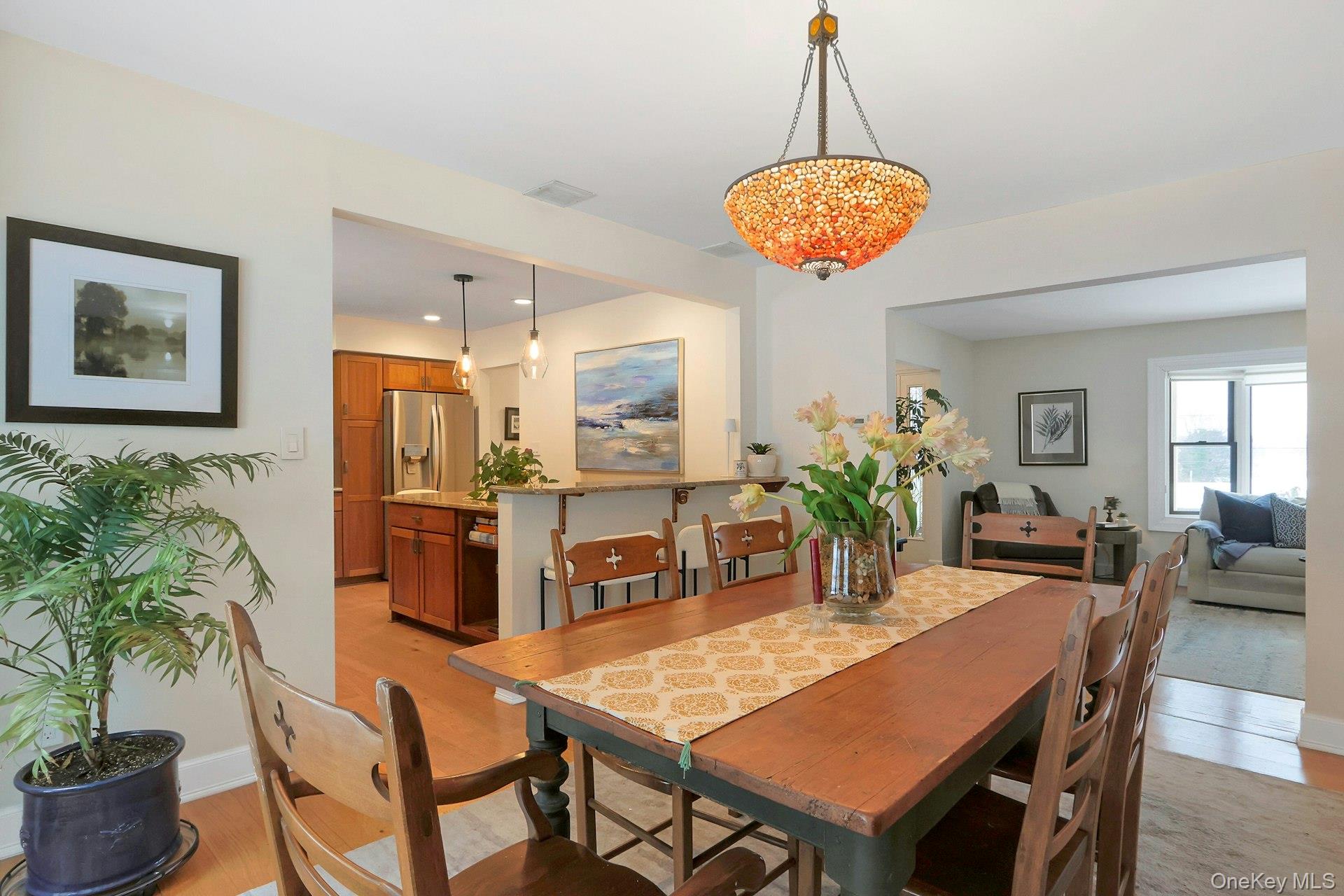 111 Wydendown Road Nyack, NY 10960 - Photo 9 of 46 a view of a dining room with furniture and wooden floor