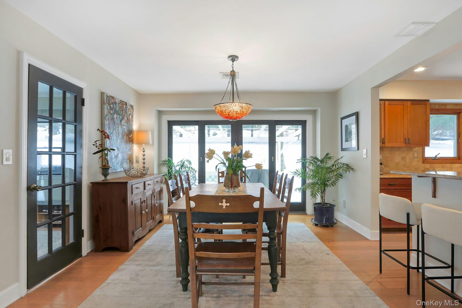 111 Wydendown Road Nyack, NY 10960 - Photo 10 of 46 a view of a dining room with furniture window and wooden floor