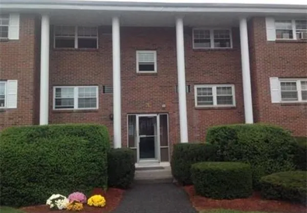 a front view of a house having yard