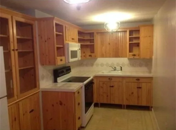 a bathroom with a granite countertop sink mirror and double